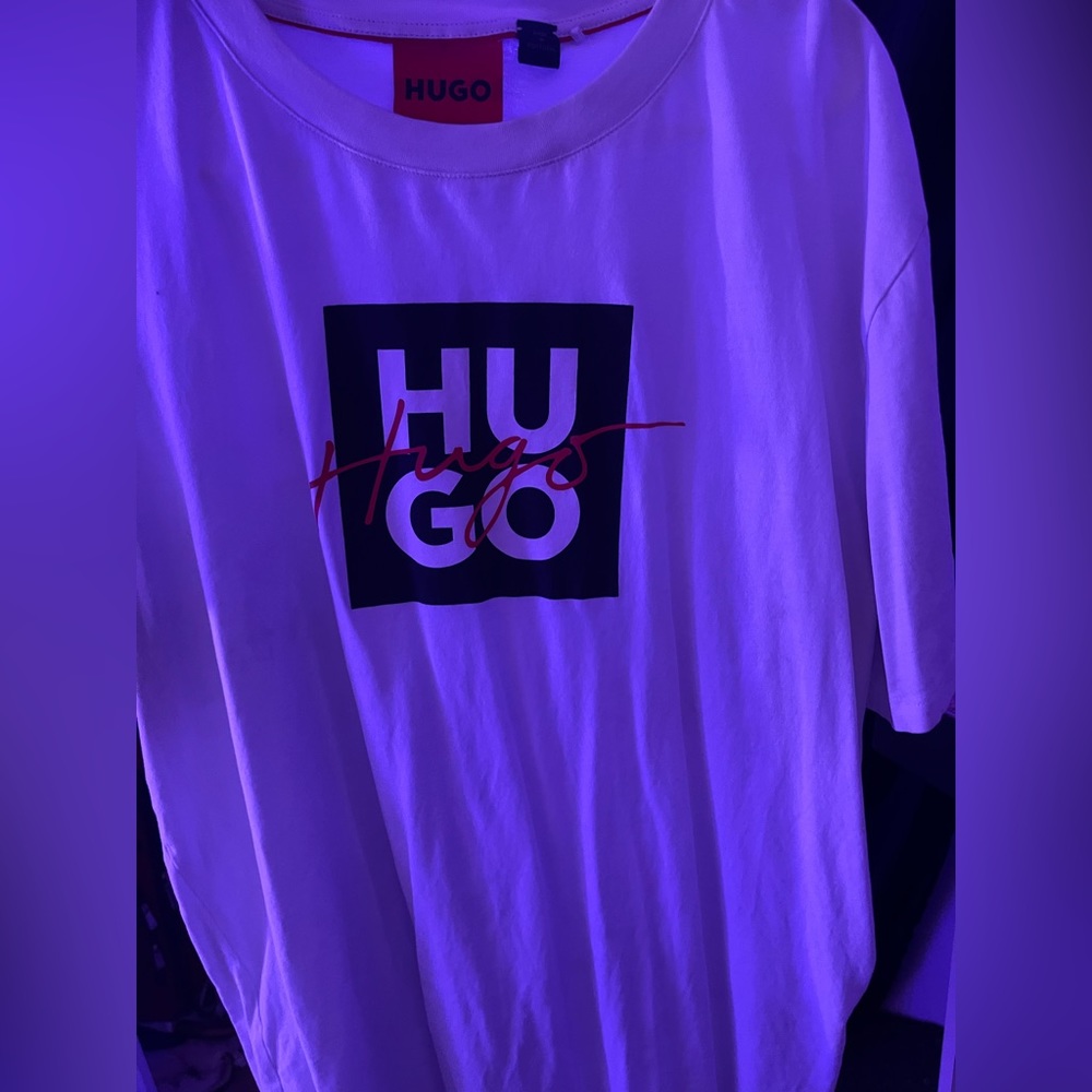 a casual t-shirt, featuring handwritten & stacked logos at the chest